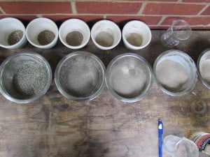 Taking mortar apart to study the original sand.